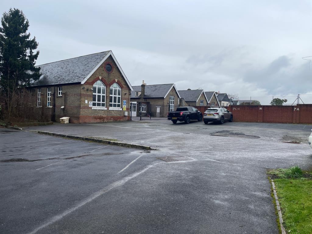 Lot: 5 - FORMER SCHOOL ON ONE ACRE SITE INCLUDING PLAYGROUND AND CAR PARK WITH POTENTIAL - General view of parking area